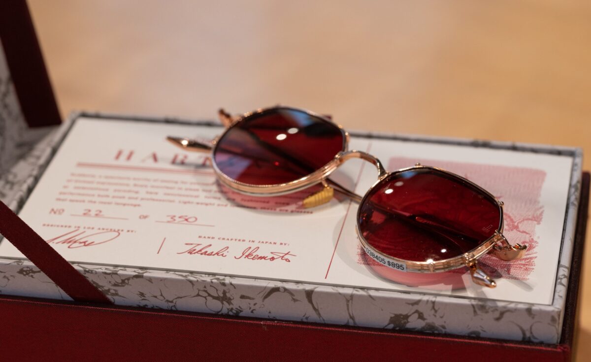 Red tinted sunglasses by Jacques Marie Mage
